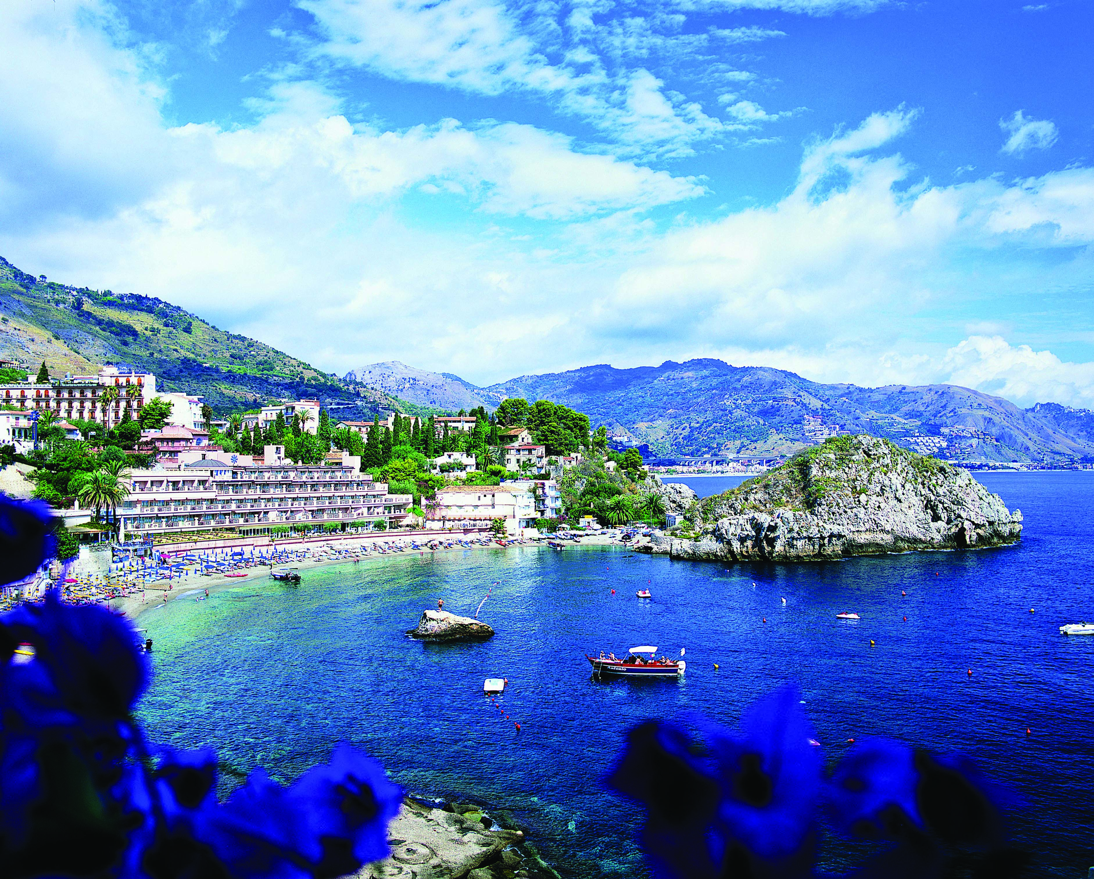 Mazzaro Sea Palace Sicily exterior hotel in background beach and sea