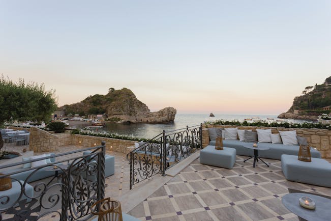 Mazzaro Sea Palace Sicily outdoor seating terrace overlooking the bay