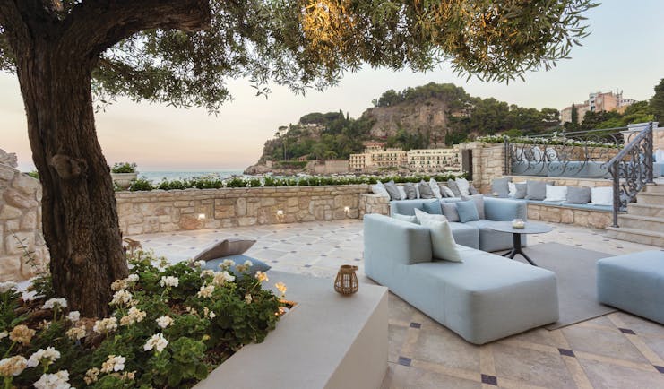 Mazzaro Sea Palace Sicily terrace outdoor seating area sofas armchairs
