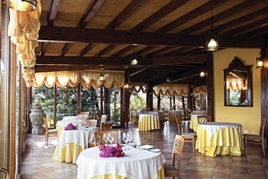 Hotel Baglio Della Luna Sicily restaurant indoor dining traditional décor