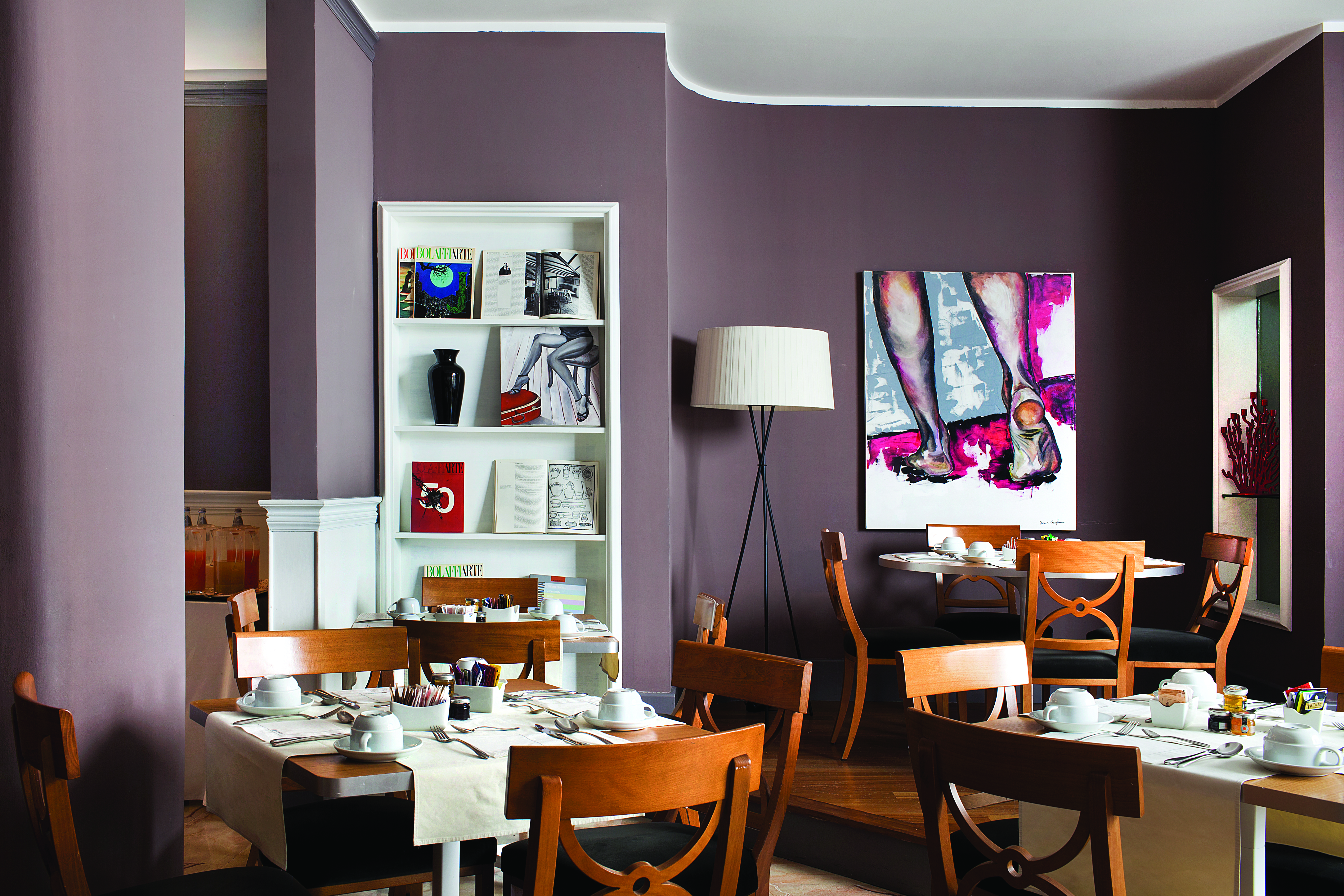 Hotel Principe di Villafranca breakfast room, tables and chairs, elegant modern decor