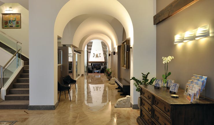 Hotel Principe di Villafranca hall, marble floors, archway, elegant decor