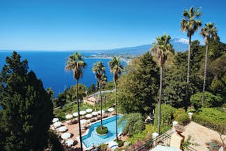 Hotel Villa Belvedere Sicily aerial shot of pool and terrace sea mount etna in background