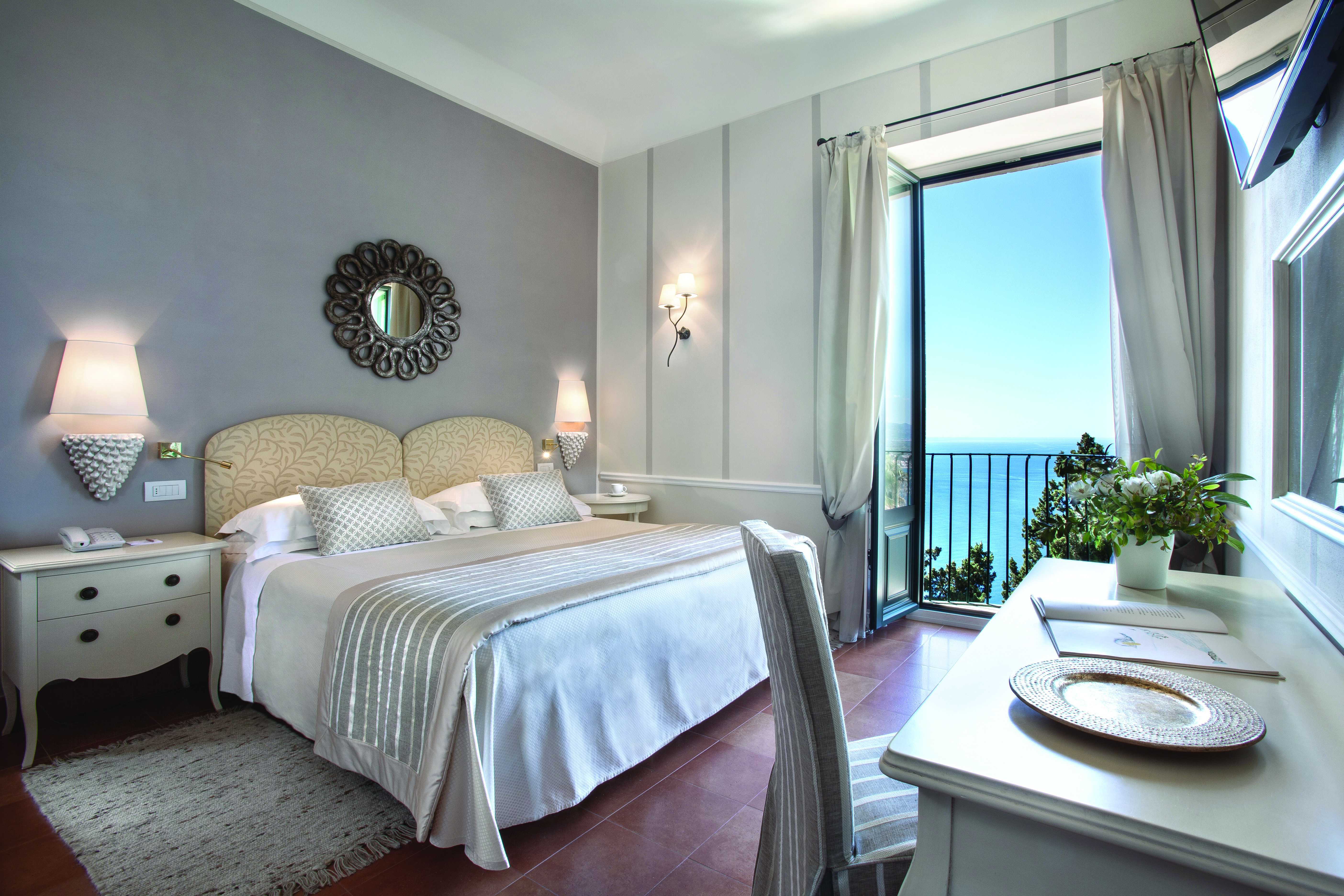 Hotel Villa Belvedere Sicily suite with balcony sea views contemporary décor