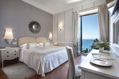 Hotel Villa Belvedere Sicily suite with balcony sea views contemporary décor