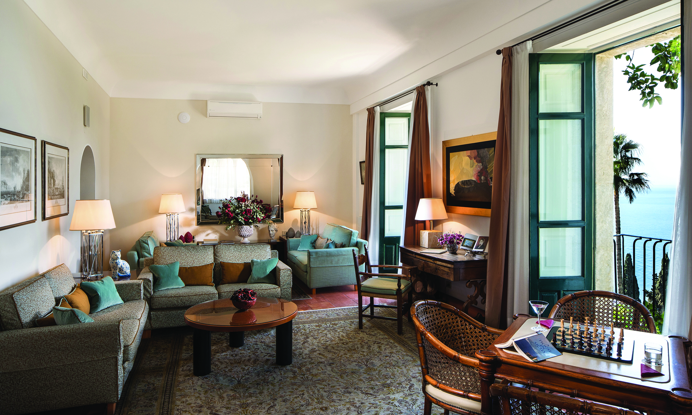 Hotel Villa Belvedere Sicily games lounge communal seating area balcony views of the sea