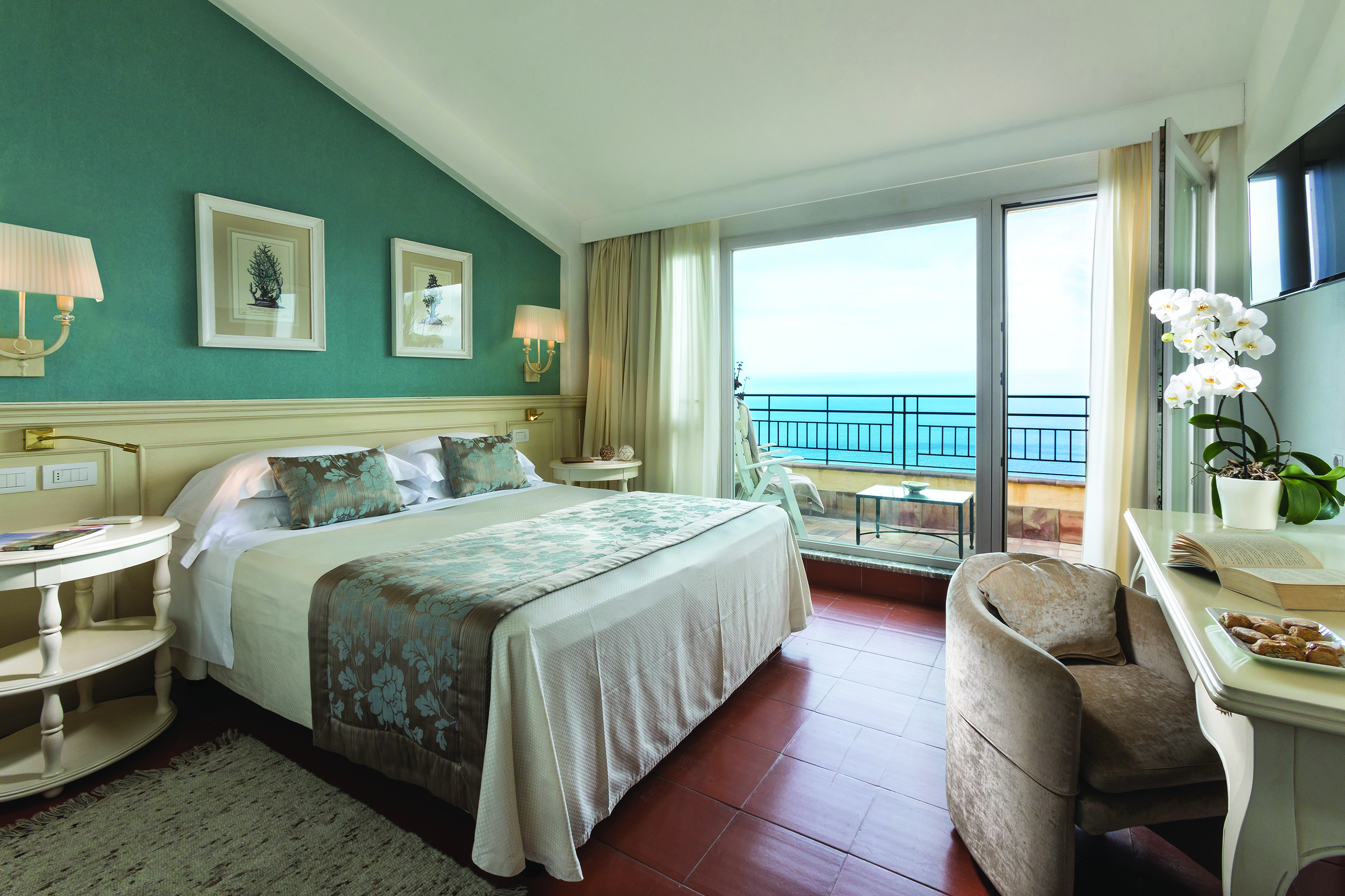 Hotel Villa Belvedere Sicily suite terrace patio doors leading to terrace with ocean views