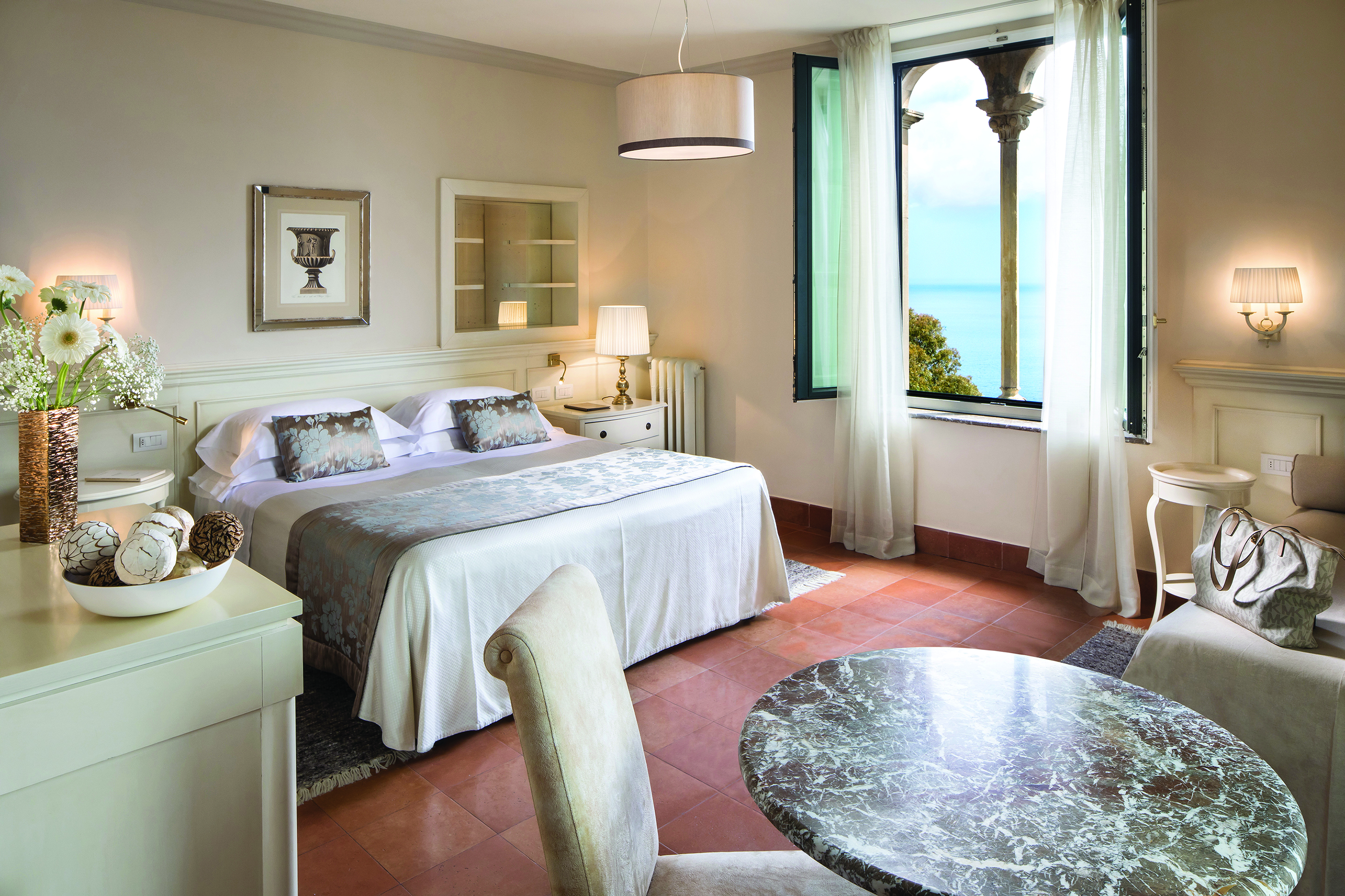 Hotel Villa Belvedere Sicily suite bed sofa contemporary seating area window with sea view