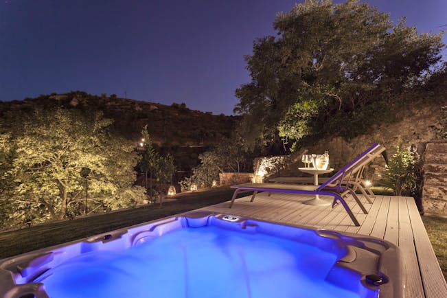 Bedroom with swimming pool at night