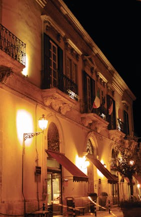 Palazzo Failla Sicily hotel exterior by night street lamp 