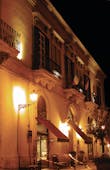 Palazzo Failla Sicily hotel exterior by night street lamp 
