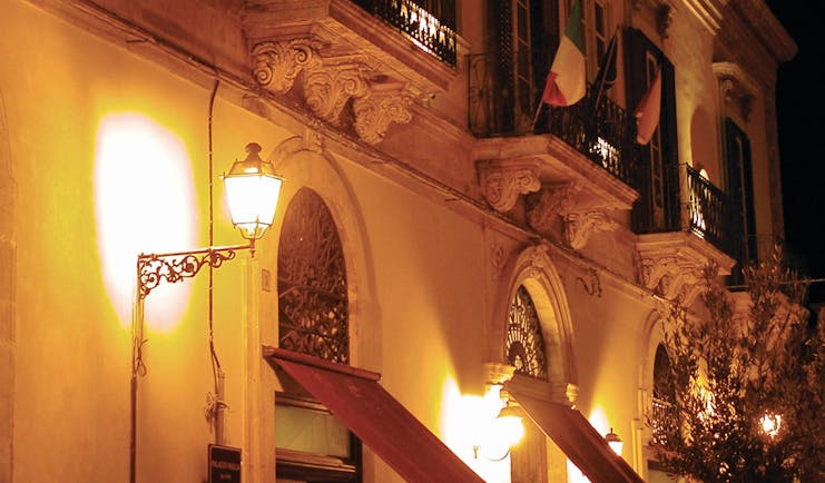 Palazzo Failla Sicily hotel exterior by night street lamp