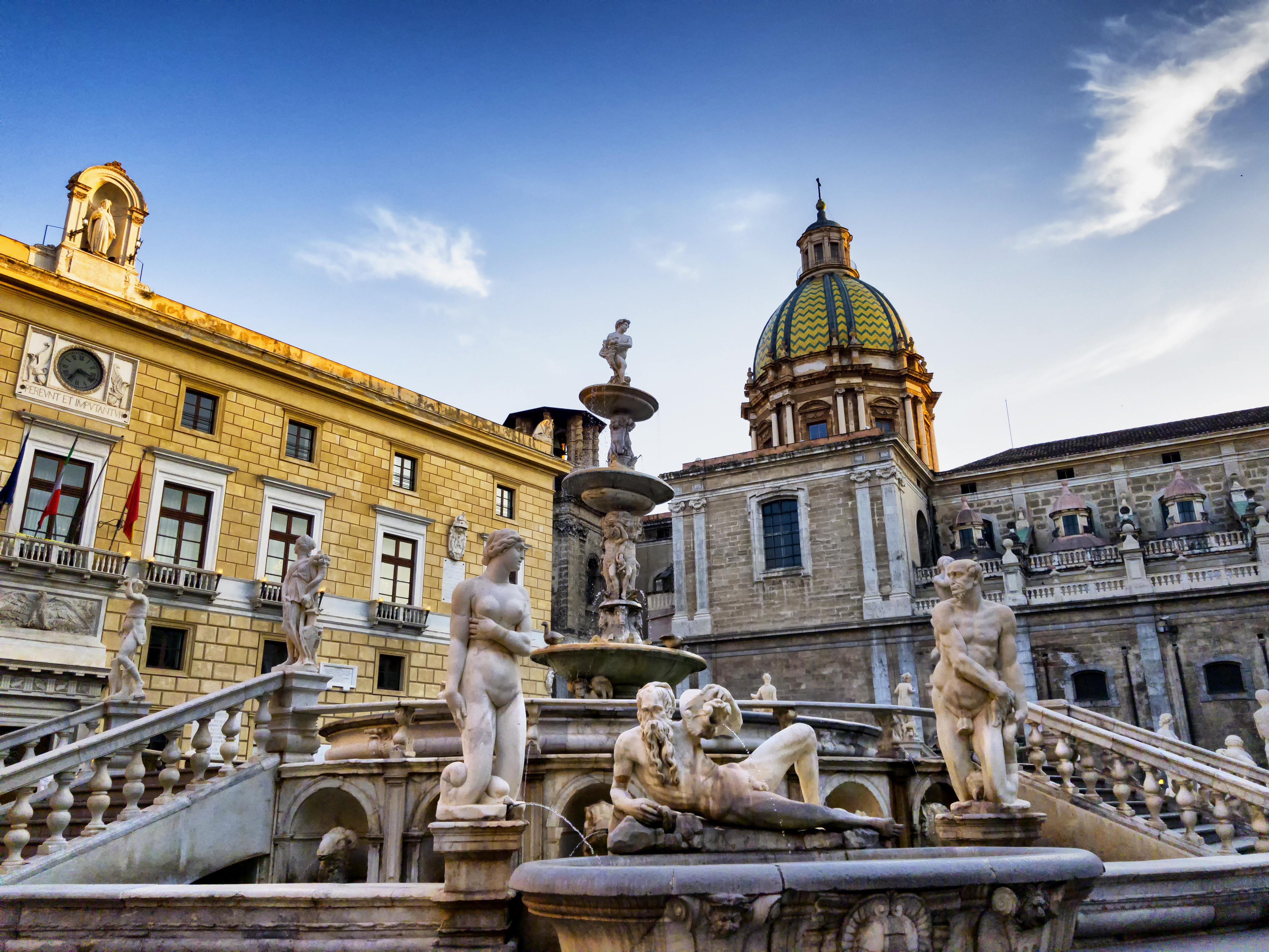 Ornate, Baroque fountain with statues in Palermo