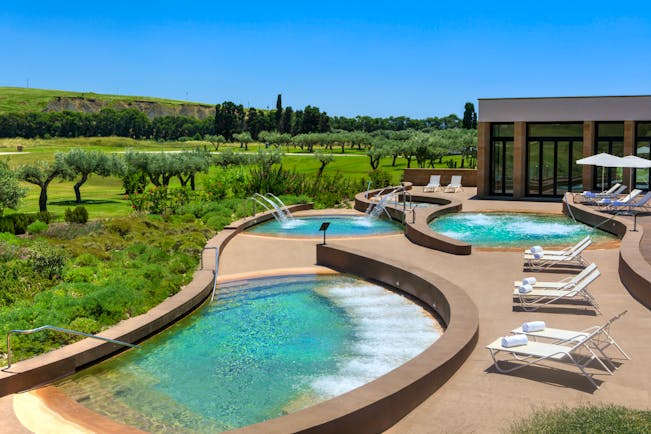 Verdura Resort curvy outdoor spa pools and terrace