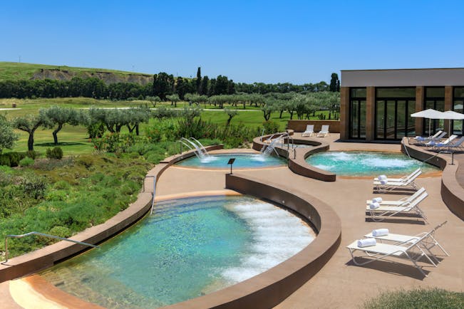 Verdura Resort curvy outdoor spa pools and terrace