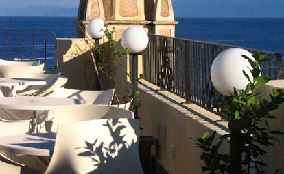 Villa Meligunis Sicily terrace dining area overlooking sea