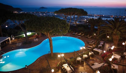 Cala del Porto Tuscany pool at night dining terrace 