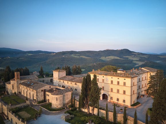 Belmond Castello di Casole Tuscany hotel exterior rural estate in background