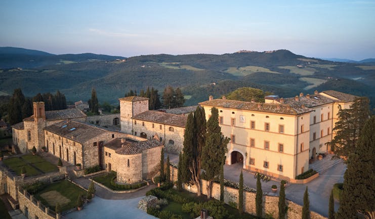 Belmond Castello di Casole Tuscany hotel exterior rural estate in background