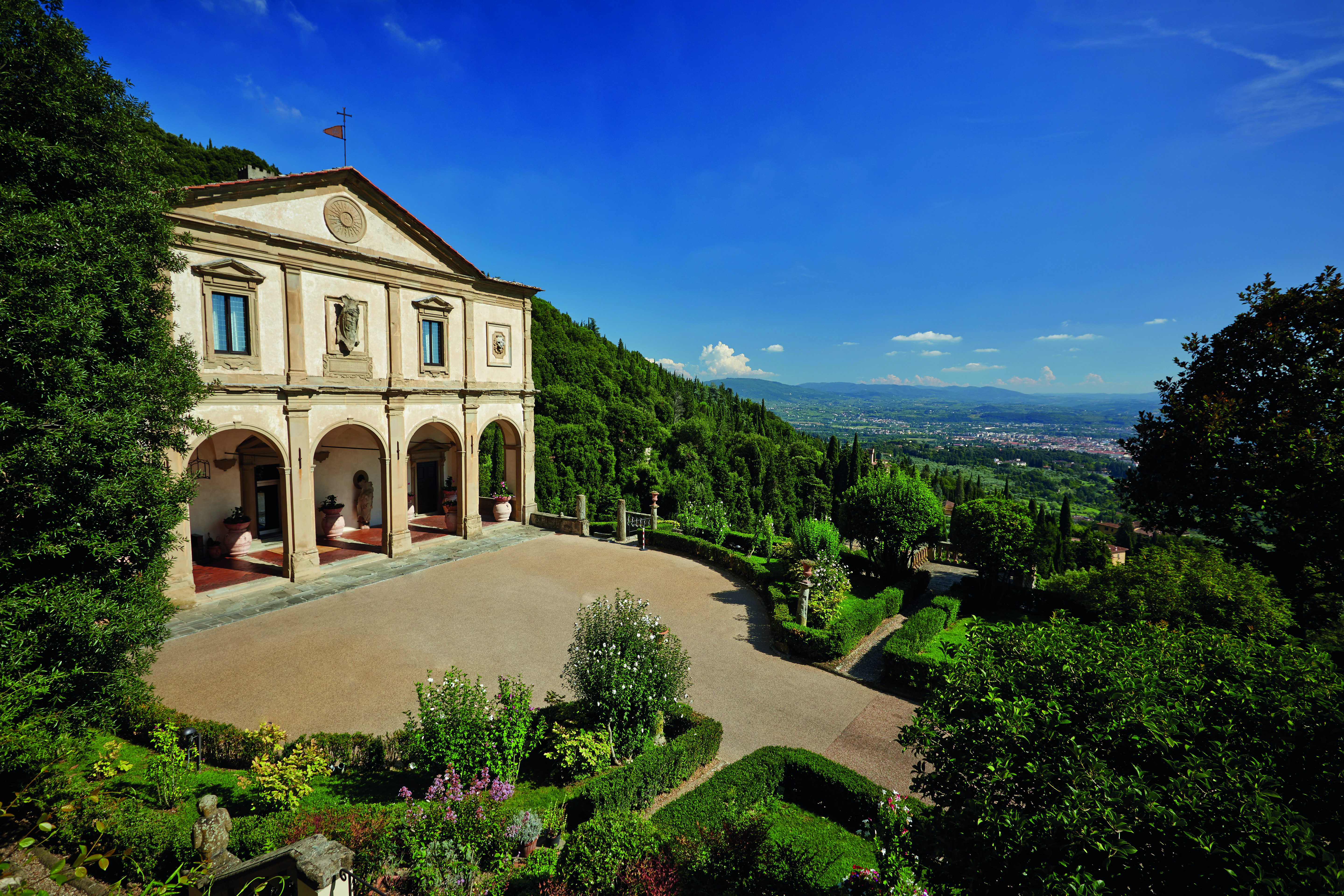 Villa San Michele Tuscany entrance drive way hotel building 