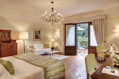 Villa San Michele Tuscany executive junior suite doors leading to terrace modern décor
