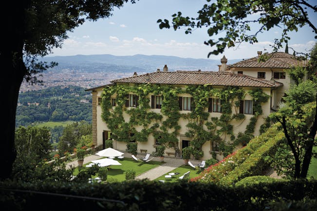 Villa San Michele Tuscany exterior hotel building lawns countryside in background