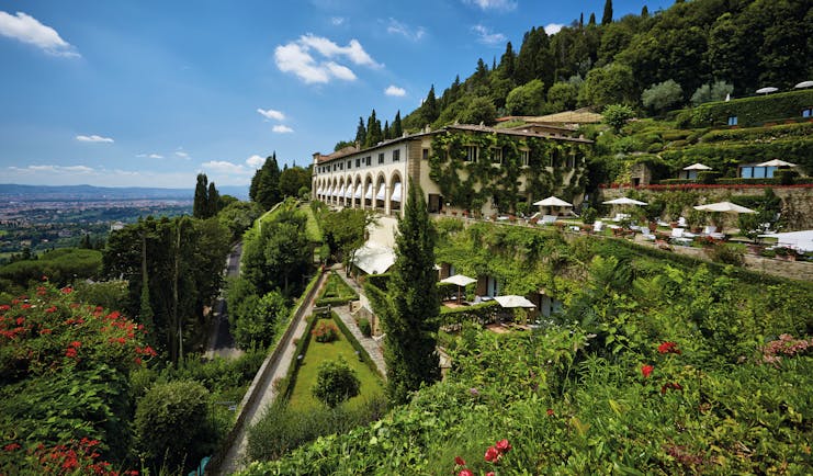 Villa San Michele Tuscany view of hotel countryside background