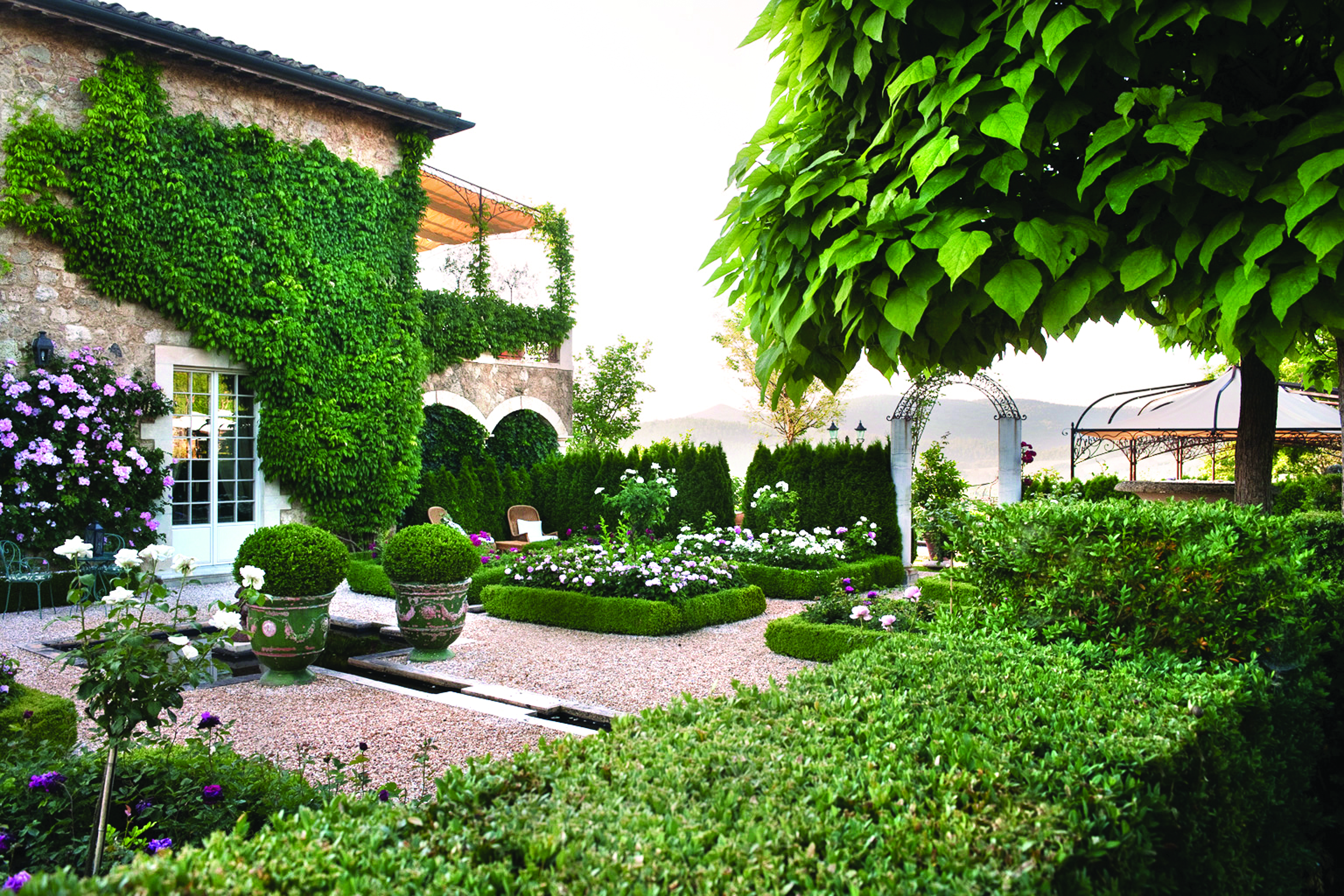 Borgo Santo Pietro Tuscany gardens greenery plants flowers