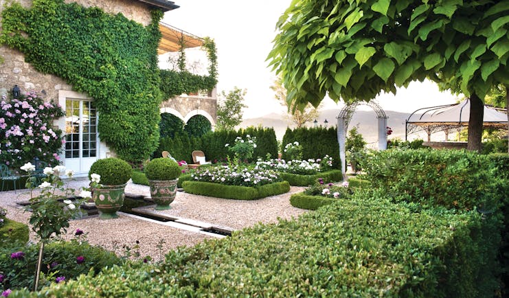 Borgo Santo Pietro Tuscany gardens greenery plants flowers