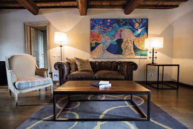 Castel Monastero Tuscany lounge area sofas modern artwork