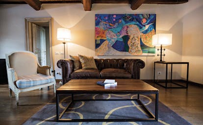 Castel Monastero Tuscany lounge area sofas modern artwork