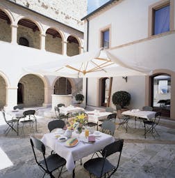 Castello di Velona Tuscany courtyard dining outdoor dining 