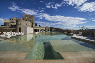 Castello di Velona Tuscany exterior pool in foreground hotel in background