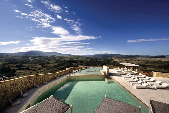 Castello di Velona Tuscany pool view sun loungers pool terrace views of countryside