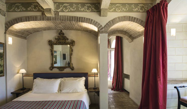 Castello di Velona Tuscany terrace suite ornate décor bed original ceiling