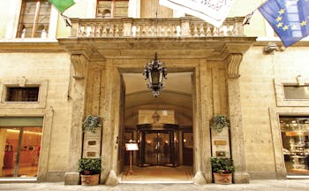 Grand Hotel Continental Tuscany entrance large stone doorway