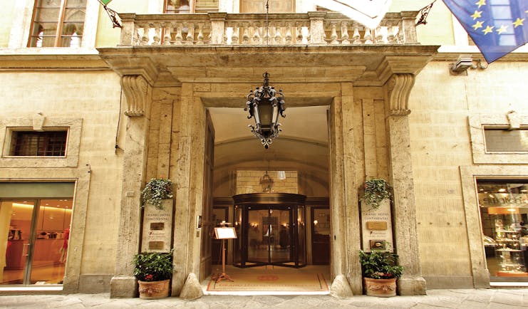 Grand Hotel Continental Tuscany entrance large stone doorway