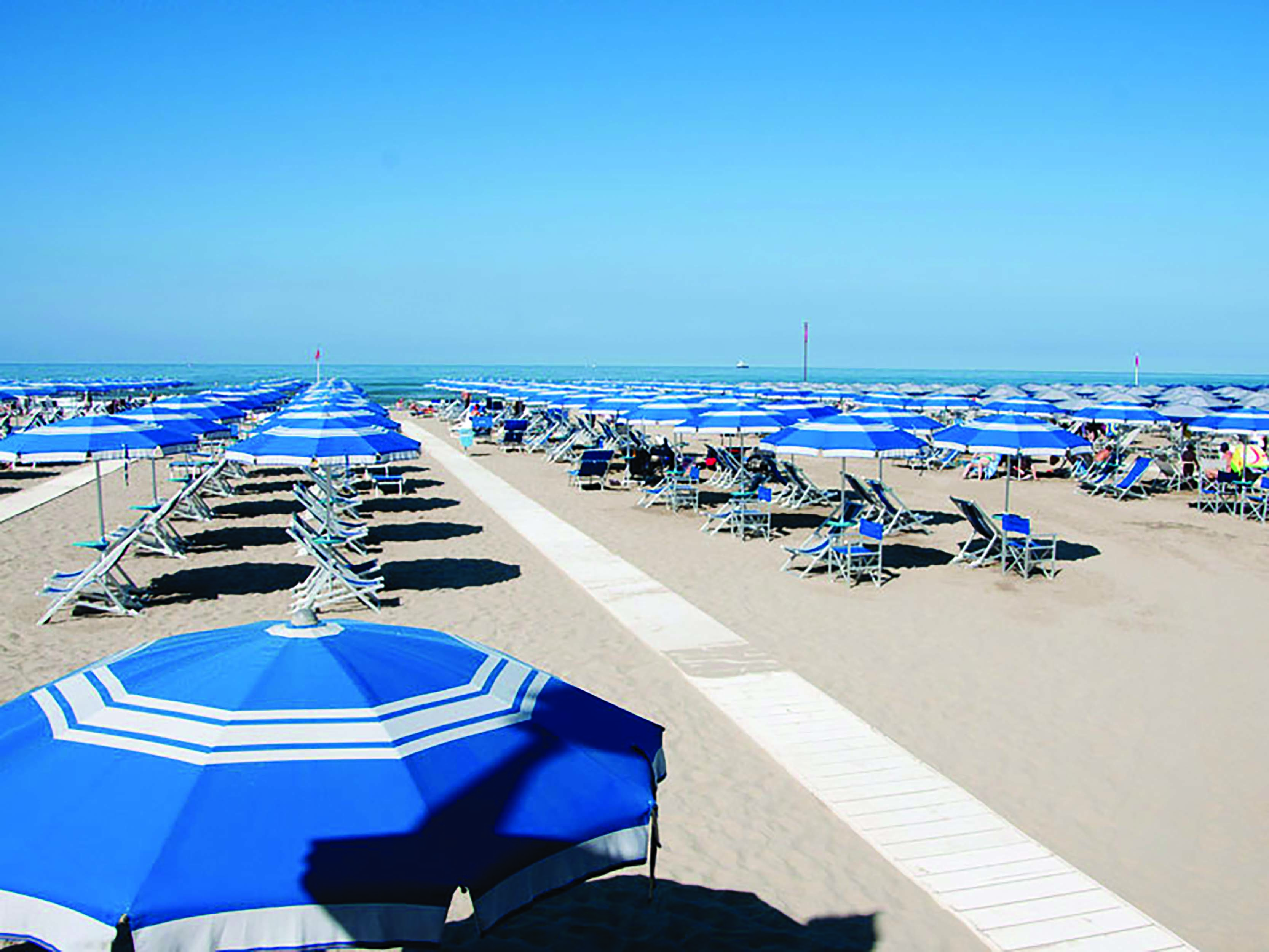 Principe di Piemonte Tuscany beach sun loungers umbrellas