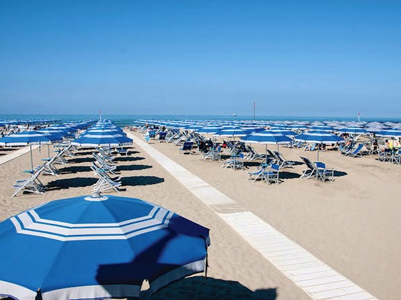 Principe di Piemonte Tuscany beach sun loungers umbrellas