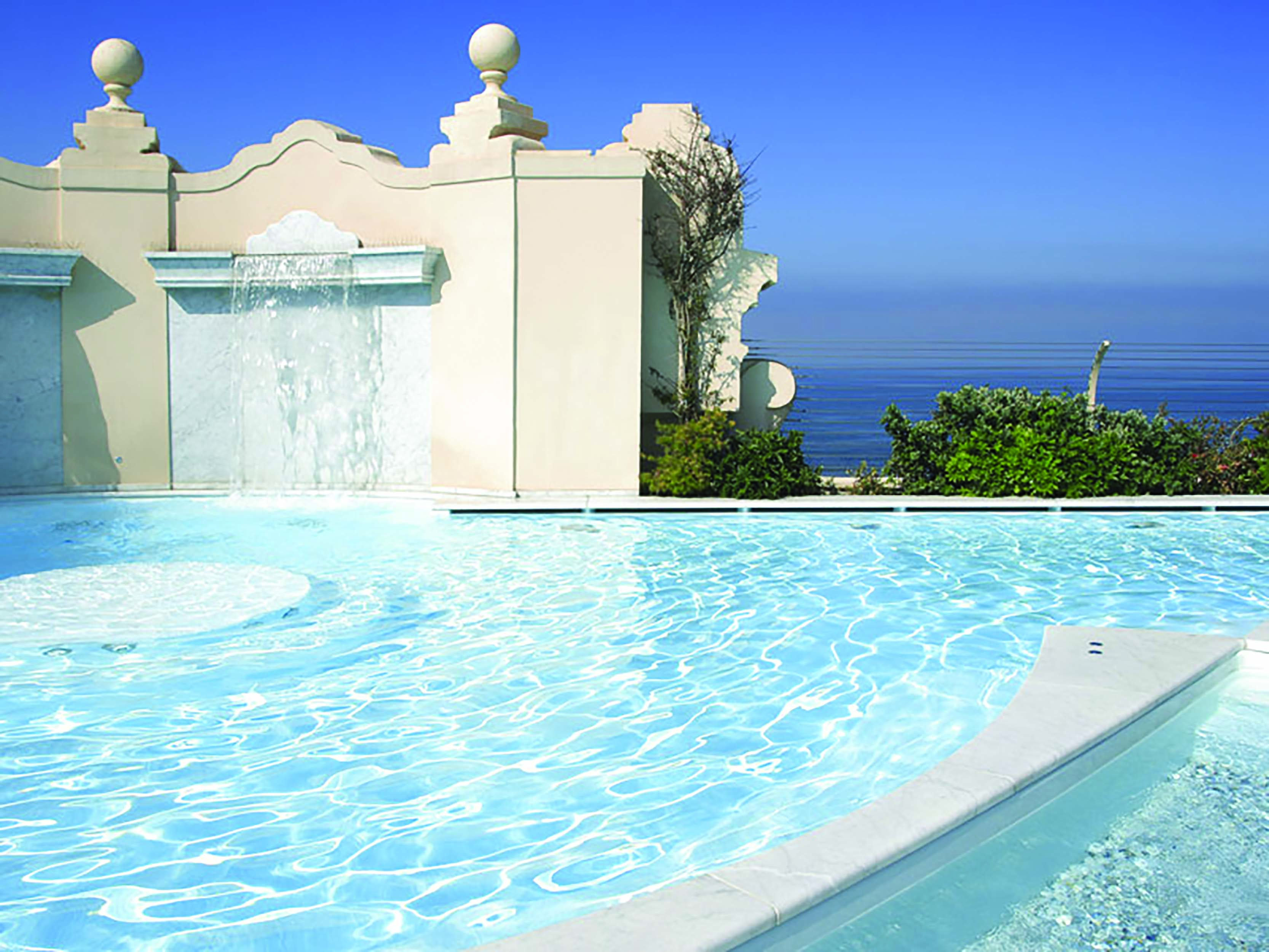 Principe di Piemonte Tuscany pool and water feature views out to sea