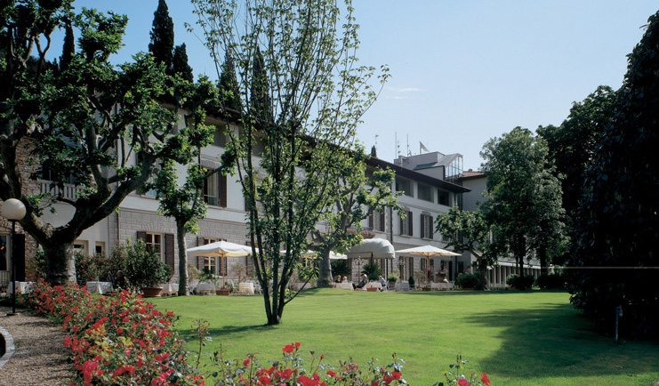 Grotta Giusti Tuscany gardens lawns trees flowers hotel building