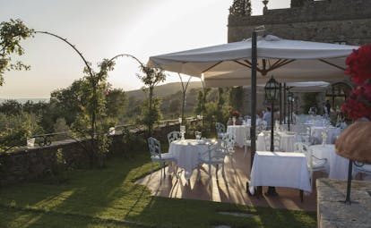 Il Faconiere Tuscany restaurant terrace outdoor dining countryside views