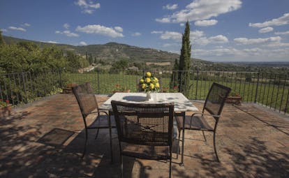 Il Faconiere Tuscany terrace outdoor seating area countryside views