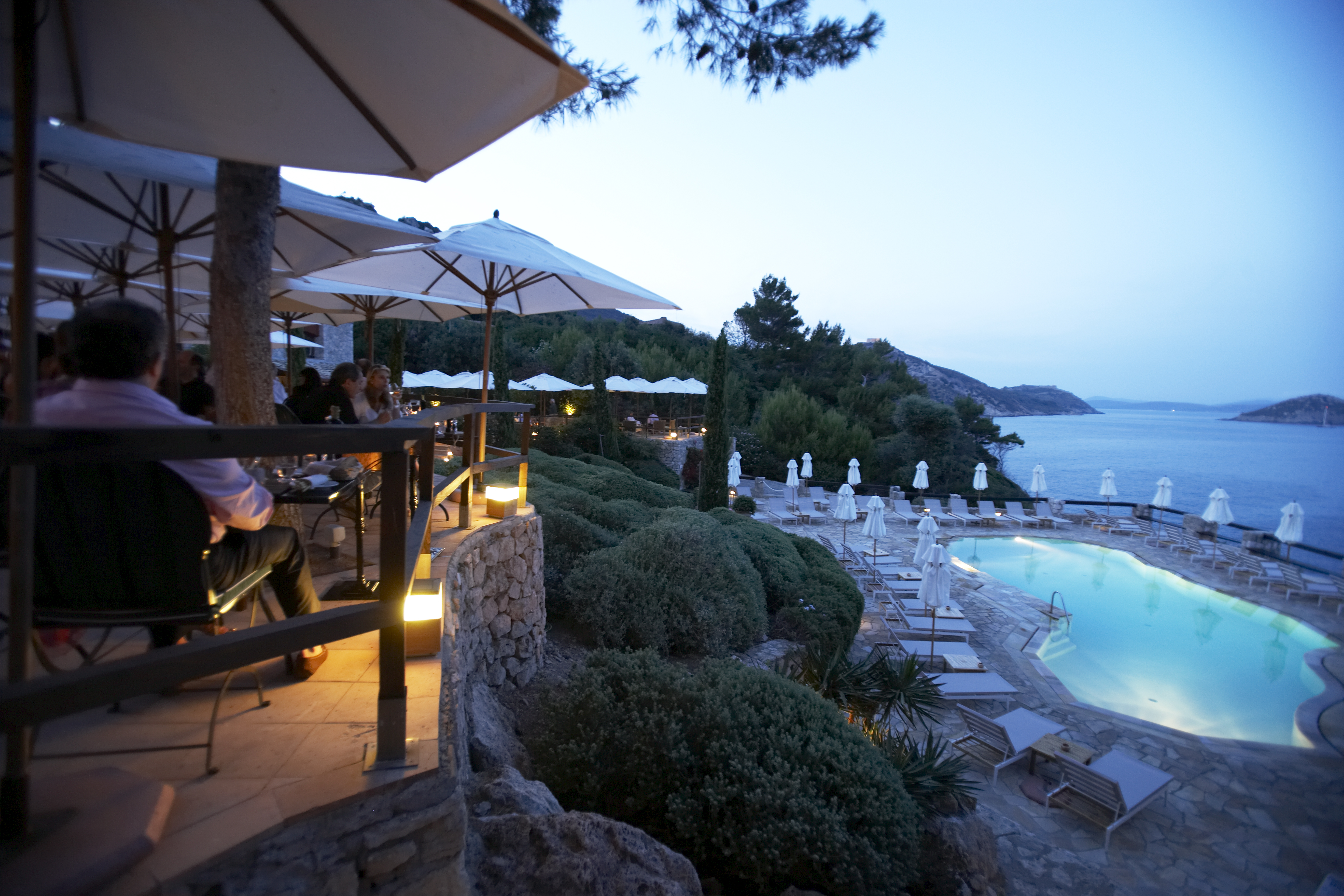 Early evening glow with lights lighting up the pol