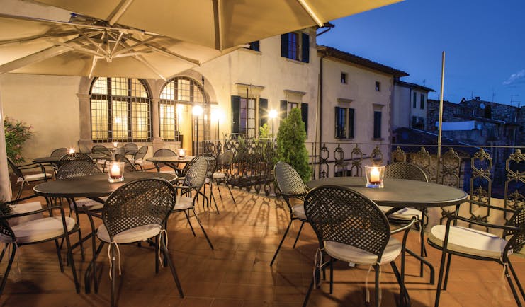 Palazzo Leopoldo Tuscany terrace outdoor seating area at night