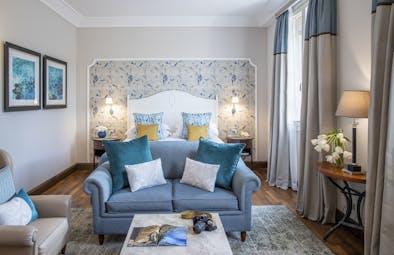 Deluxe room with blue sofa