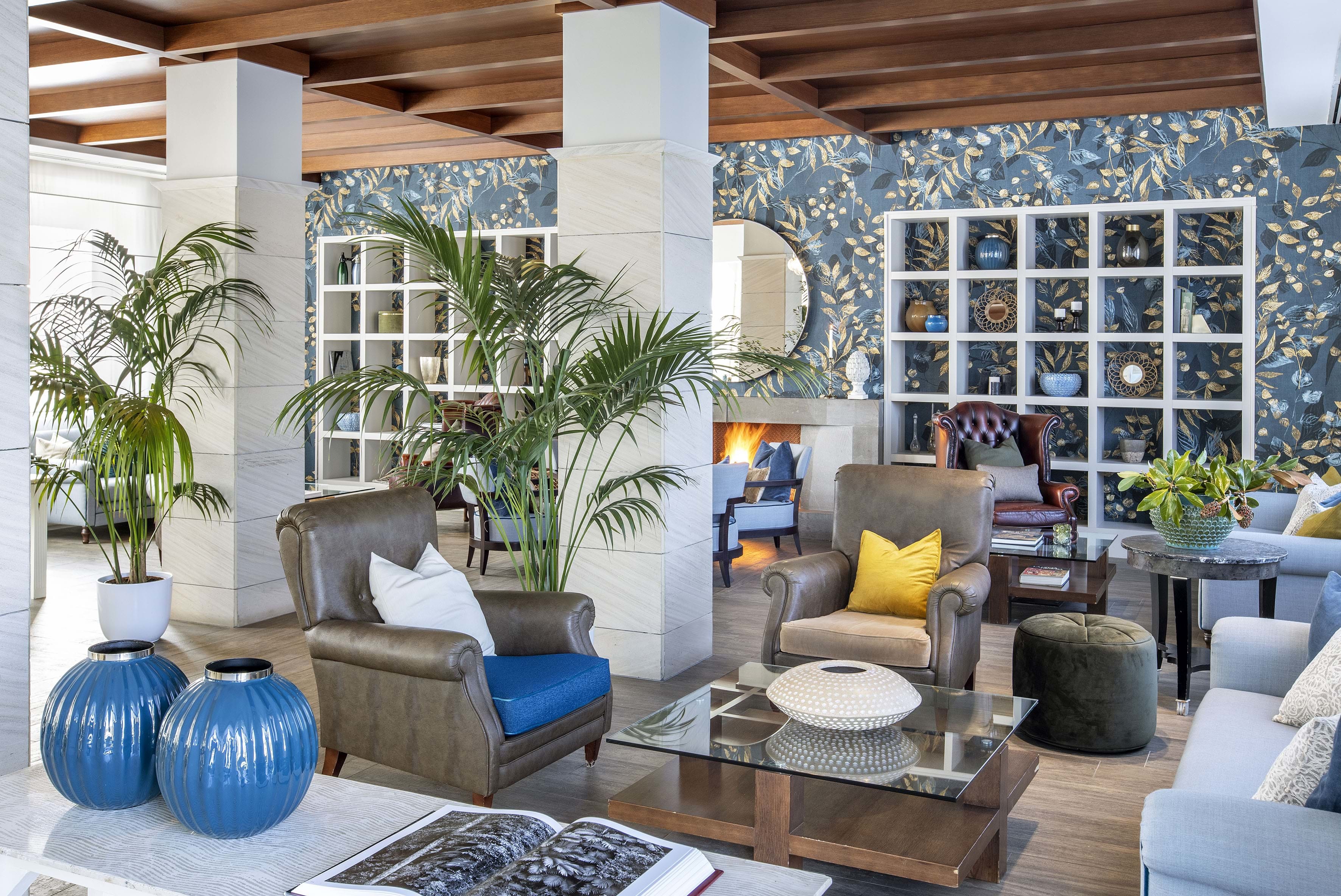 Coloured wall tiles and pot plants in library