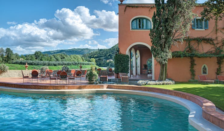 Villa La Massa Tuscany pool outdoor seating countryside in background