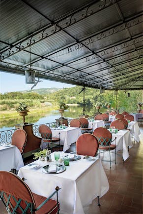 Villa La Massa Tuscany terrace restaurant out door dining overlooking the river Arno