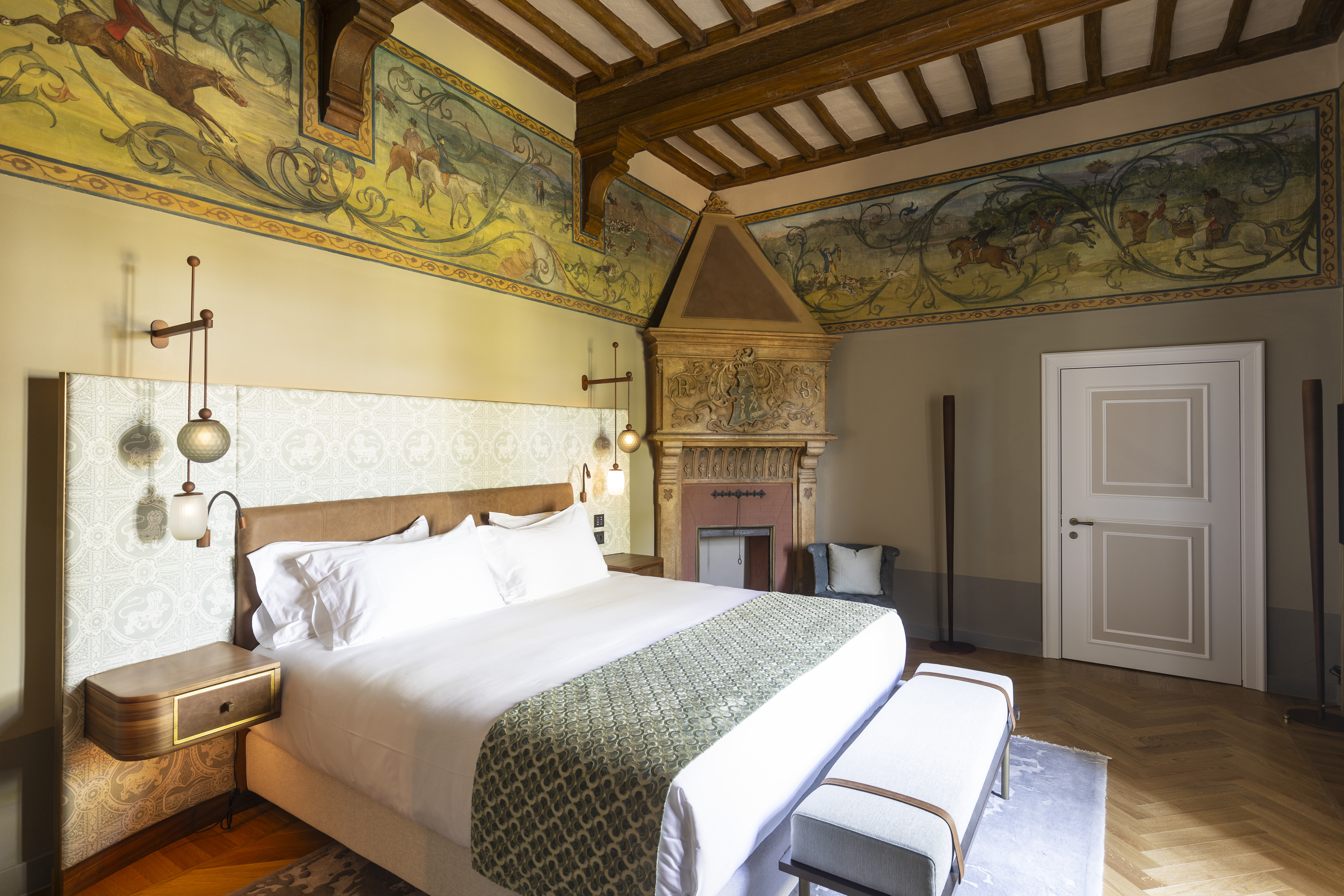 Borgo dei Conti Contessa Suite, with beamed ceilings, ornate painted frescoes, and antique wooden furnishing